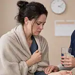 Person receiving supervised support during heroin withdrawal with clock and calendar showing withdrawal duration